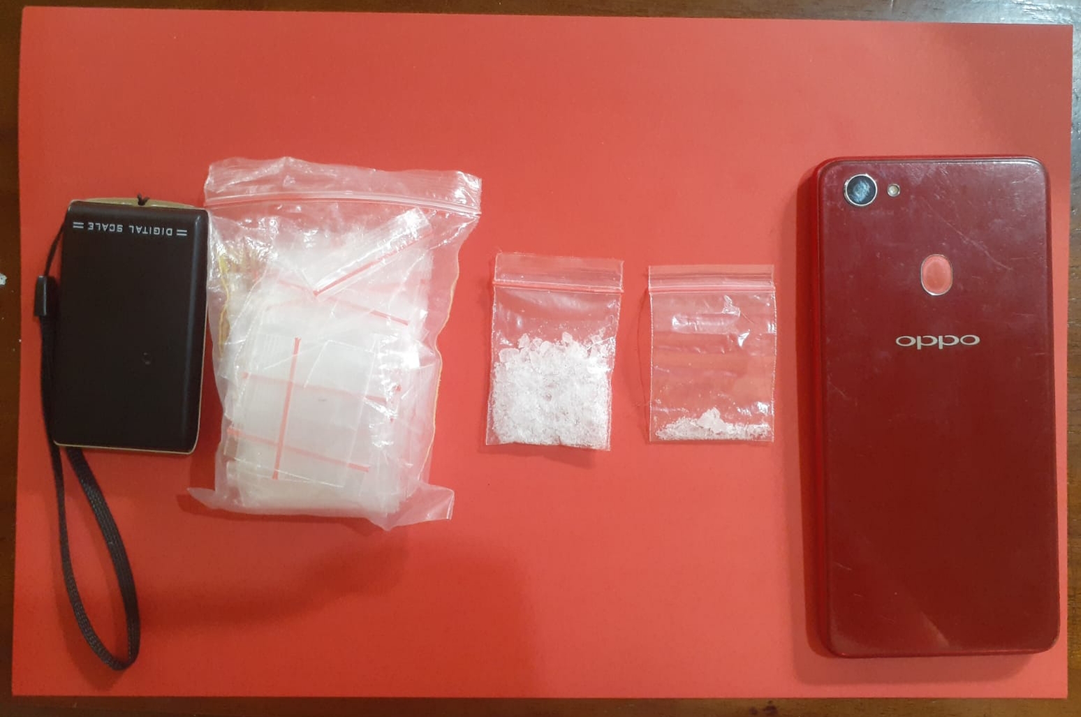 Barang bukti narkotika jenis sabu seberat 2,28 gram dan Handphone